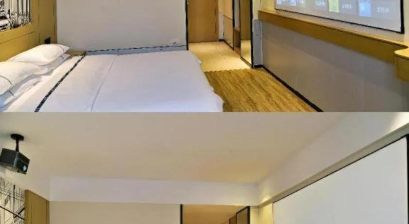 Bed in City Comfort Inn Jiyuan Jishui Avenue Jigang