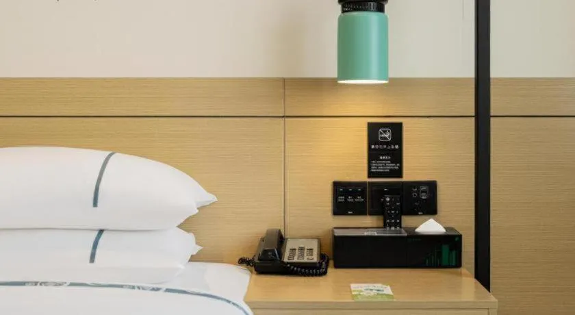 Bed in City Comfort Inn Fangchenggang Qisha