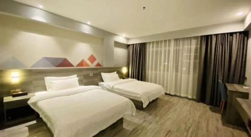 Bed in Borrman Hotel Fangchenggang Qisha