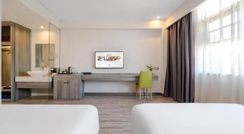 Bed in Borrman Hotel Fangchenggang Qisha