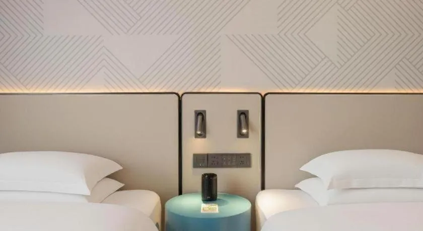 Bed in Borrman Hotel Fangchenggang Qisha