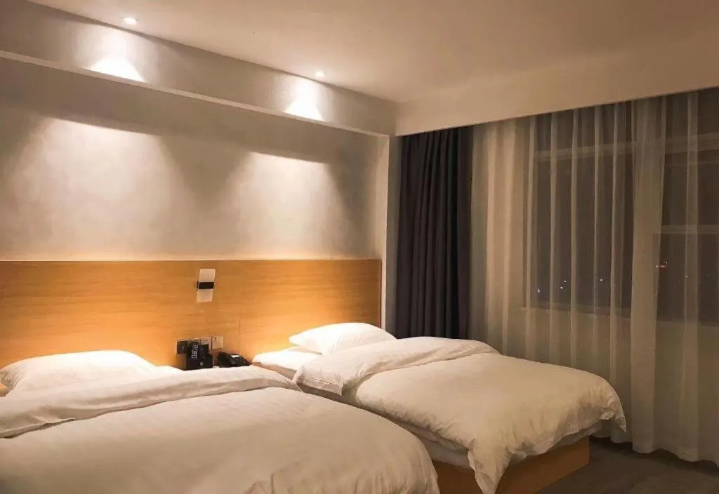 Bed in Borrman Hotel Fangchenggang Qisha