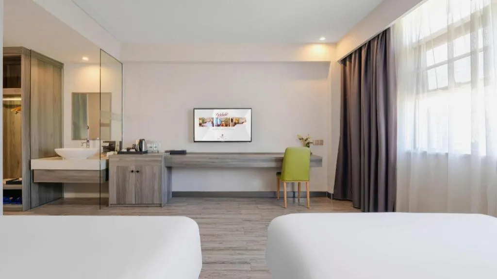 Bed in Borrman Hotel Fangchenggang Qisha