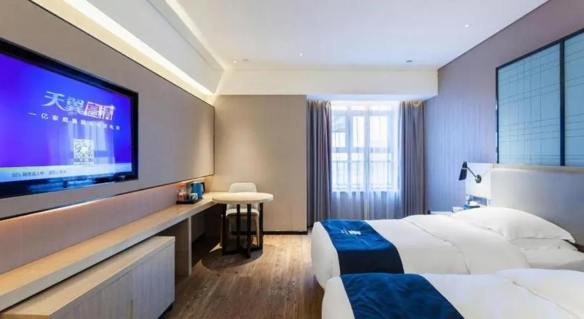 Bed in Echarm Hotel Suzhou Shengze Oriental Extile City