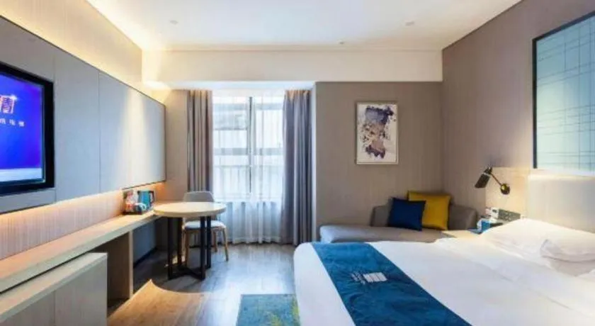 Bed in Echarm Hotel Suzhou Shengze Oriental Extile City