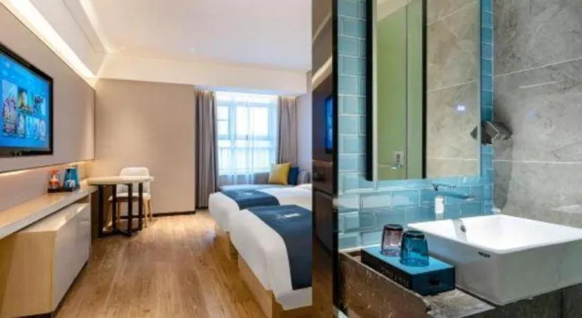 Bed in Echarm Hotel Suzhou Shengze Oriental Extile City