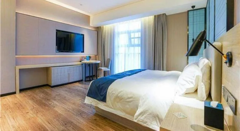 Bed in Echarm Hotel Suzhou Shengze Oriental Extile City