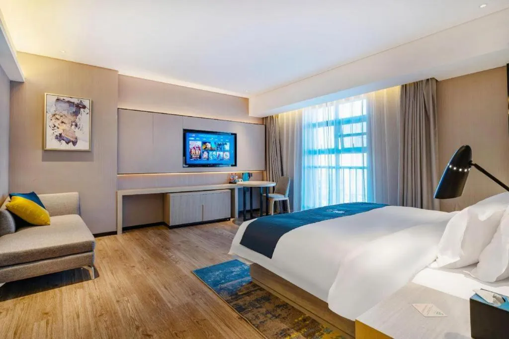 Bed in Echarm Hotel Suzhou Shengze Oriental Extile City