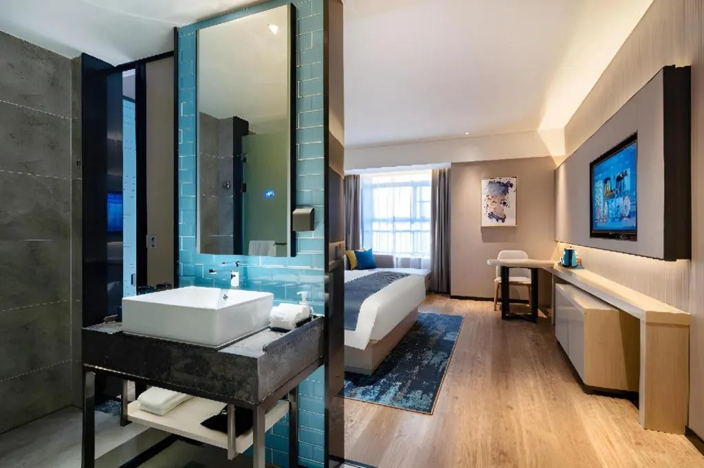 Bed in Echarm Hotel Suzhou Shengze Oriental Extile City