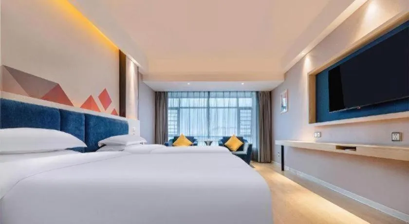 Bed in Borrman Hotel Liuzhou High-Speed Railway Station