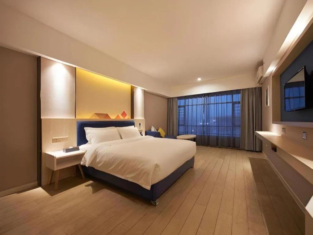 Bed in Borrman Hotel Liuzhou High-Speed Railway Station
