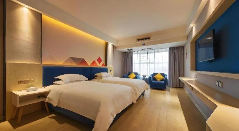 Bed in Borrman Hotel Liuzhou High-Speed Railway Station