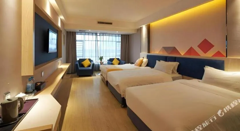 Bed in Borrman Hotel Liuzhou High-Speed Railway Station