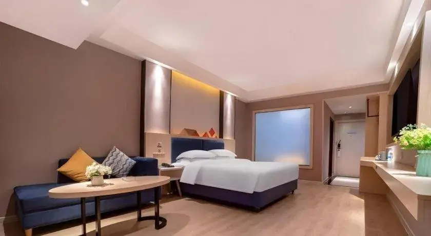 Bed in Borrman Hotel Liuzhou High-Speed Railway Station Bed in Borrman Hotel Liuzhou High-Speed Railway Station