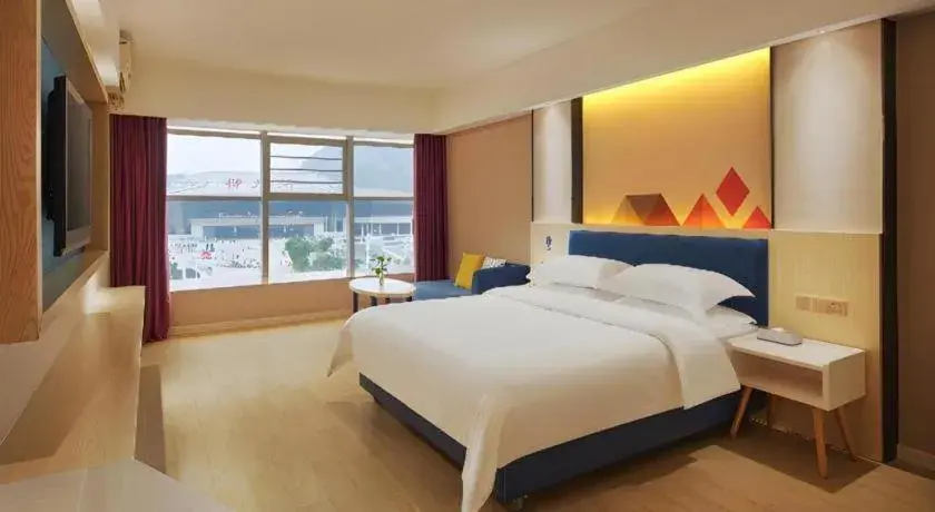 Bed in Borrman Hotel Liuzhou High-Speed Railway Station Bed in Borrman Hotel Liuzhou High-Speed Railway Station