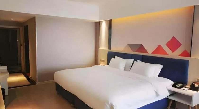 Bed in Borrman Hotel Liuzhou High-Speed Railway Station