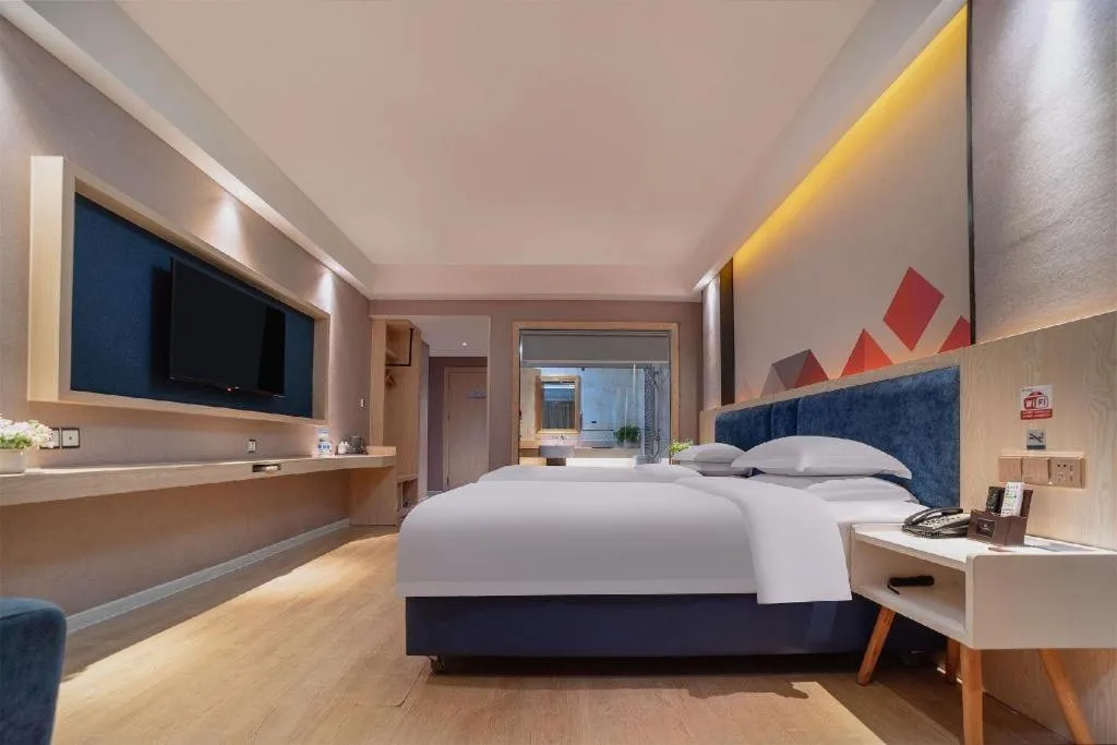 Bed in Borrman Hotel Liuzhou High-Speed Railway Station