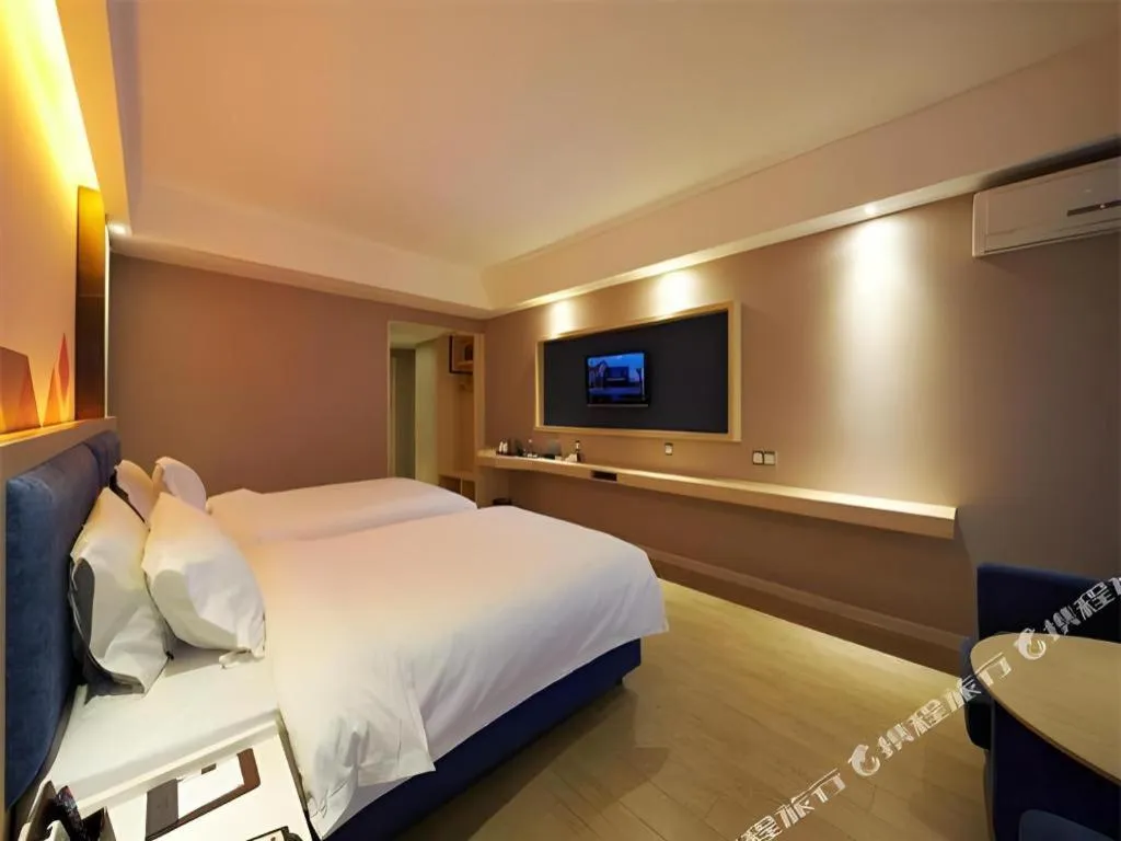 Bed in Borrman Hotel Liuzhou High-Speed Railway Station