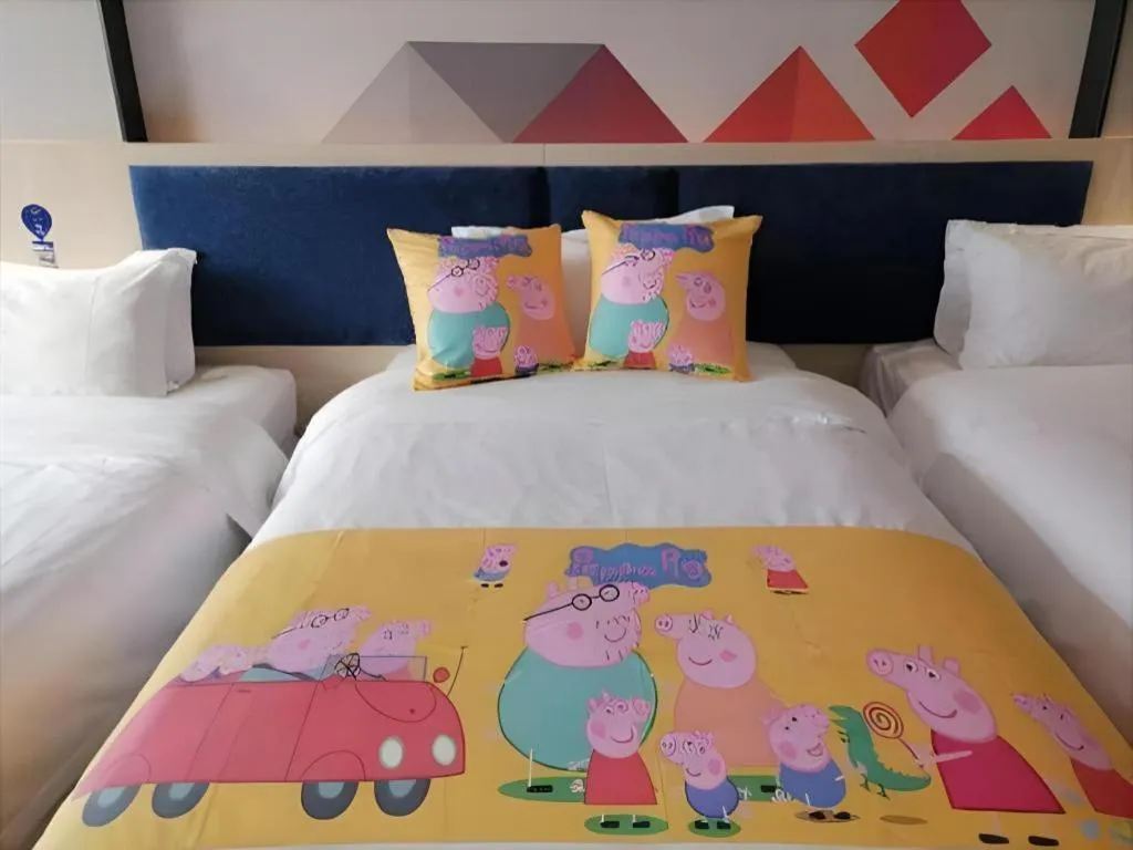 Bed in Borrman Hotel Liuzhou High-Speed Railway Station