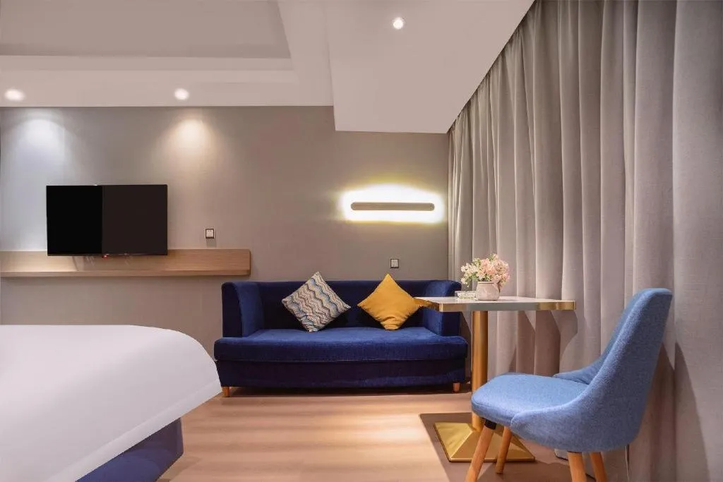 Bed in Borrman Hotel Liuzhou High-Speed Railway Station