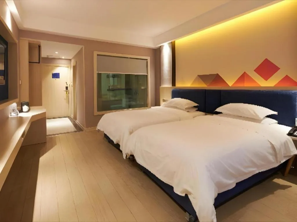 Bed in Borrman Hotel Liuzhou High-Speed Railway Station
