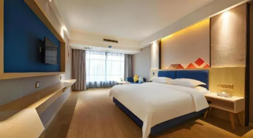 Bed in Borrman Hotel Liuzhou High-Speed Railway Station Bed in Borrman Hotel Liuzhou High-Speed Railway Station