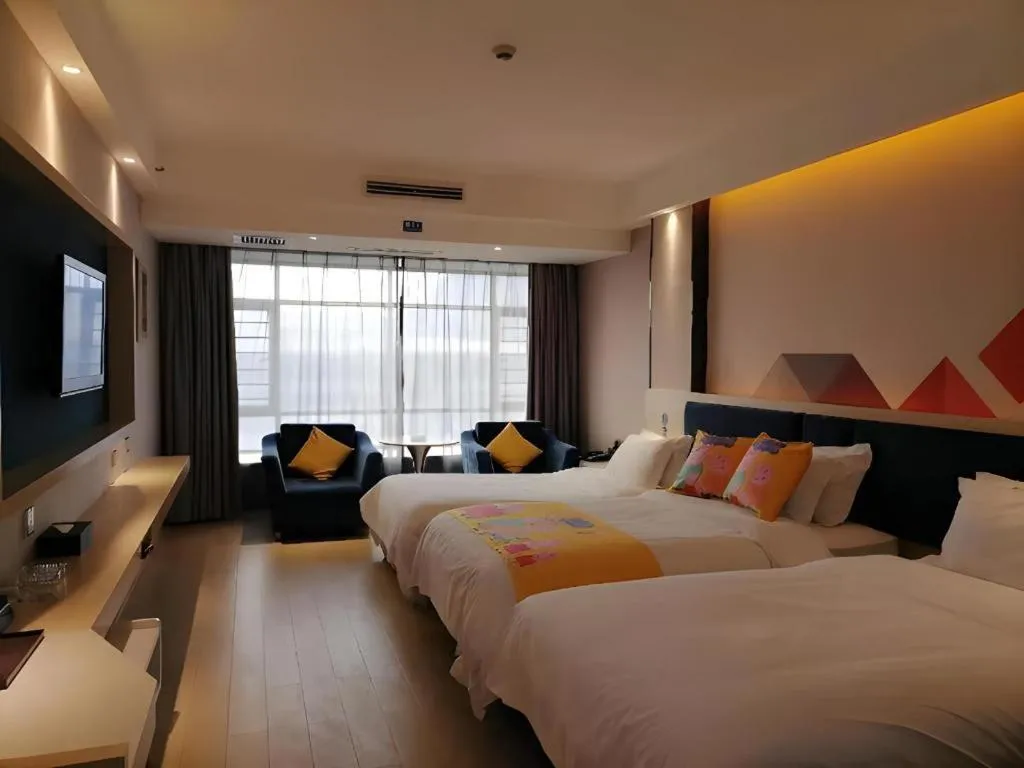 Bed in Borrman Hotel Liuzhou High-Speed Railway Station