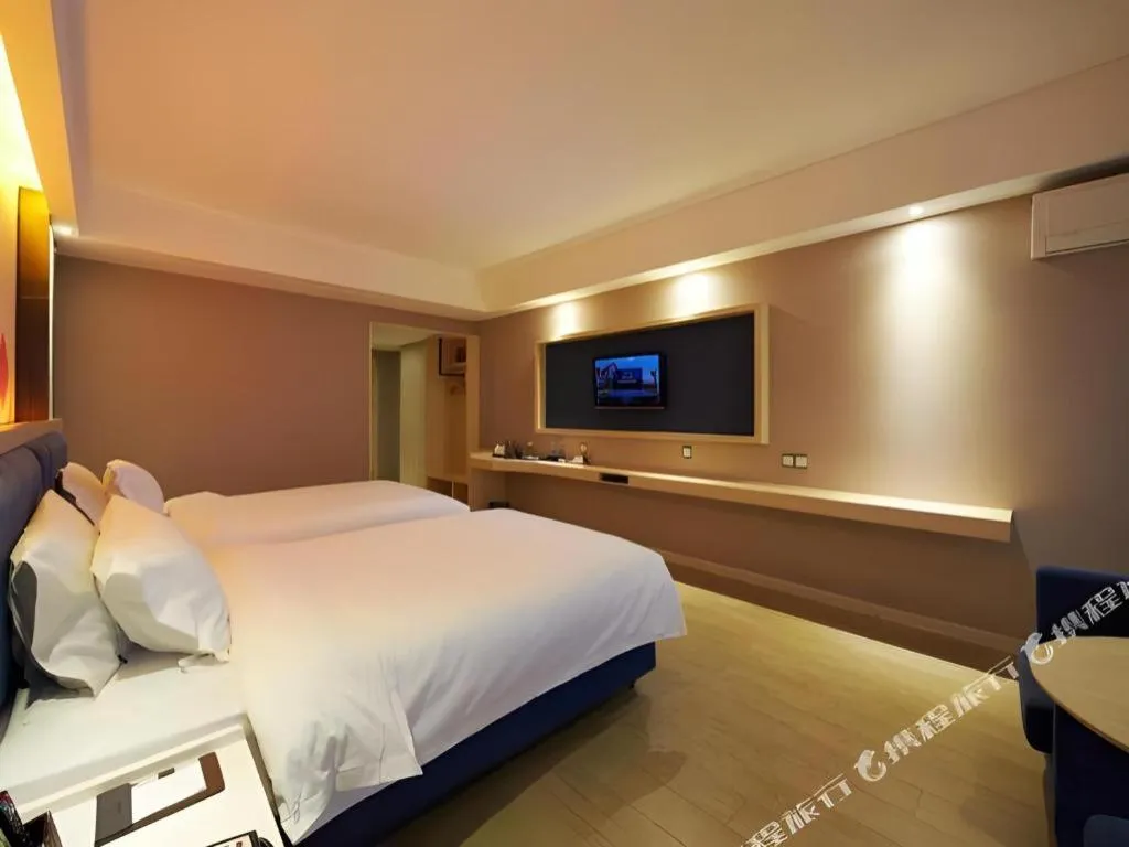 Bed in Borrman Hotel Liuzhou High-Speed Railway Station