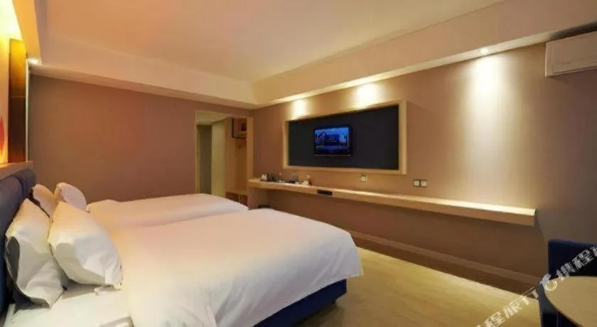 Bed in Borrman Hotel Liuzhou High-Speed Railway Station
