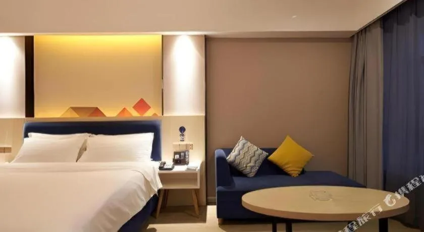 Bed in Borrman Hotel Liuzhou High-Speed Railway Station