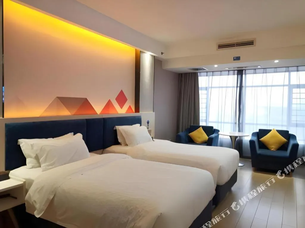 Bed in Borrman Hotel Liuzhou High-Speed Railway Station