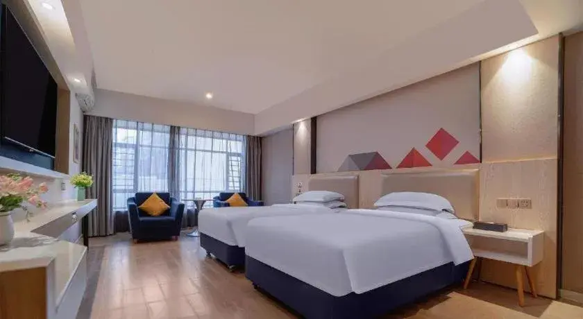 Bed in Borrman Hotel Liuzhou High-Speed Railway Station Bed in Borrman Hotel Liuzhou High-Speed Railway Station