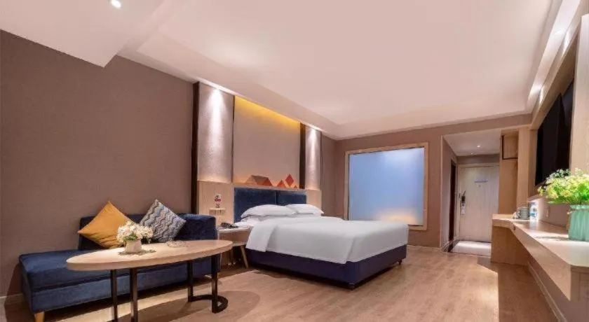 Bed in Borrman Hotel Liuzhou High-Speed Railway Station