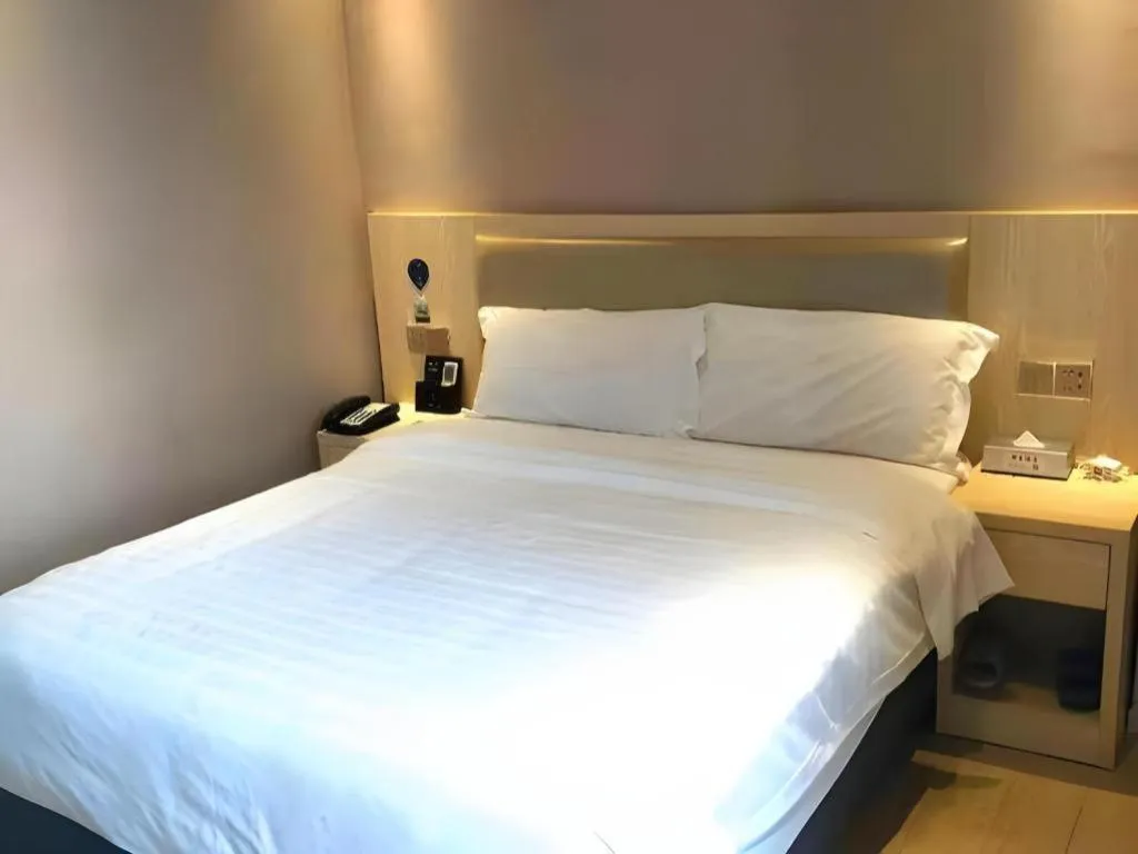Bed in Borrman Hotel Liuzhou High-Speed Railway Station