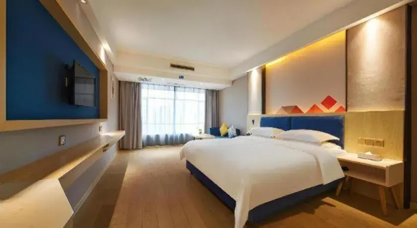 Bed in Borrman Hotel Liuzhou High-Speed Railway Station Bed in Borrman Hotel Liuzhou High-Speed Railway Station