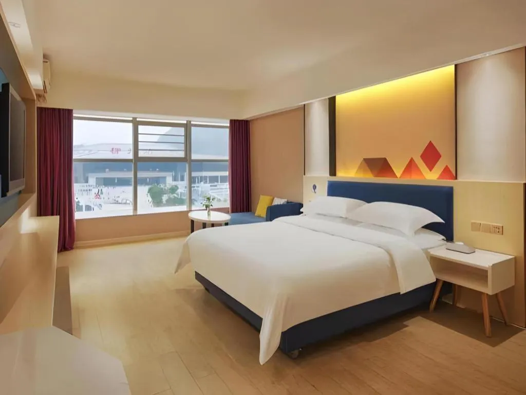 Bed in Borrman Hotel Liuzhou High-Speed Railway Station