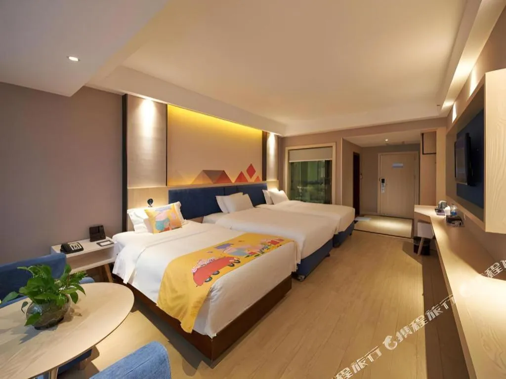 Bed in Borrman Hotel Liuzhou High-Speed Railway Station