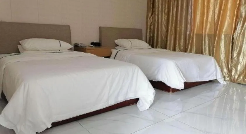 Bed in City Comfort Inn Shaoguan Biguiyuan Phoenix City Gold Village