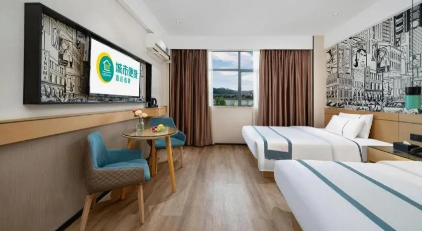 Bed in City Comfort Inn Shaoguan Biguiyuan Phoenix City Gold Village