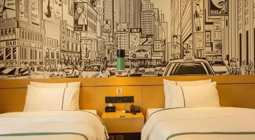 Bed in City Comfort Inn Shaoguan Biguiyuan Phoenix City Gold Village