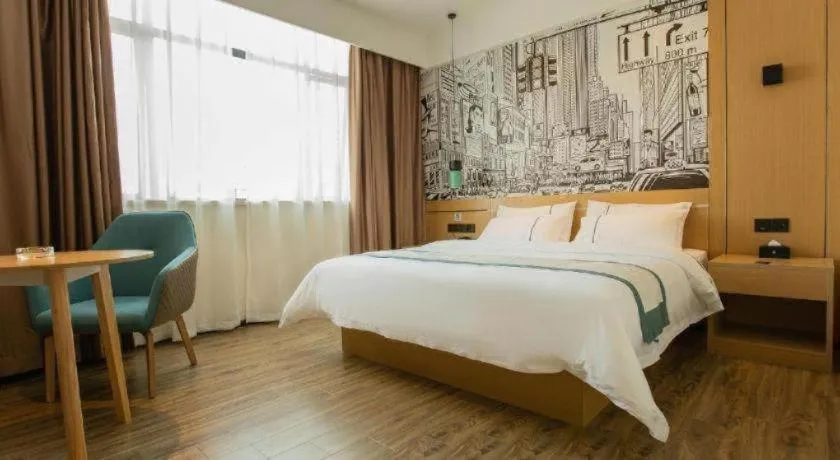 Bed in City Comfort Inn Shaoguan Biguiyuan Phoenix City Gold Village