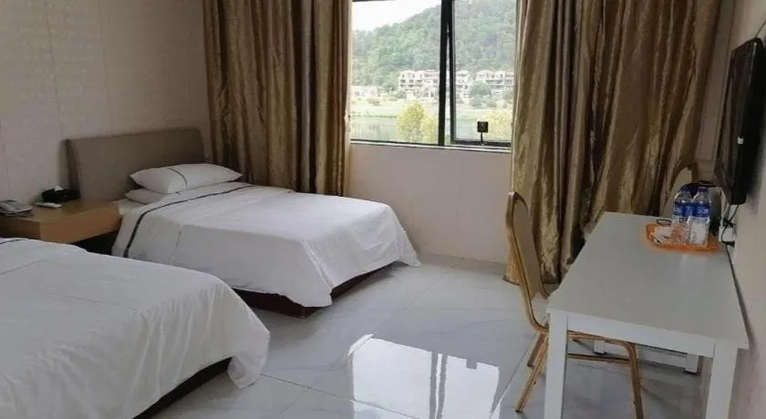 Bed in City Comfort Inn Shaoguan Biguiyuan Phoenix City Gold Village