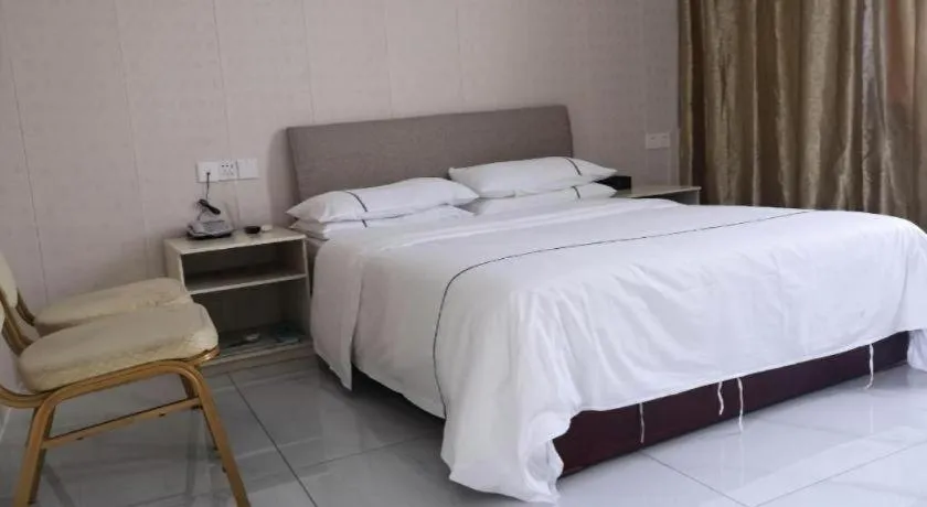 Bed in City Comfort Inn Shaoguan Biguiyuan Phoenix City Gold Village