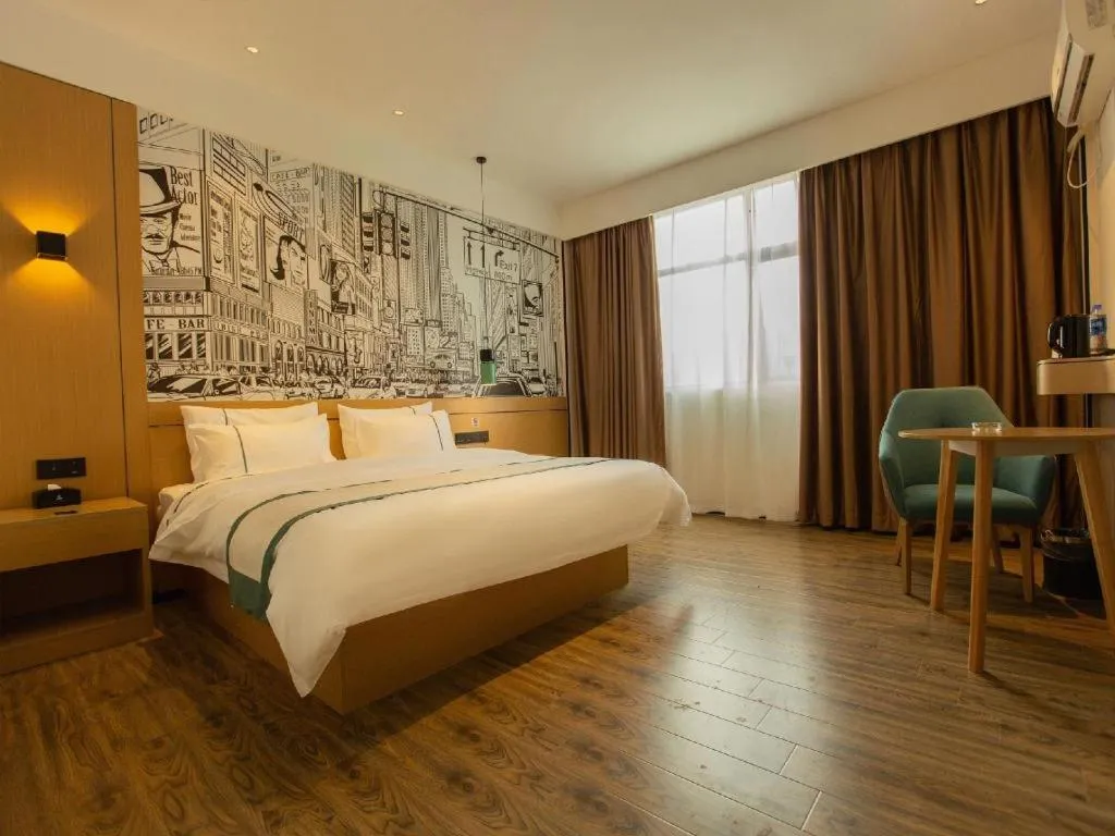 Bed in City Comfort Inn Shaoguan Biguiyuan Phoenix City Gold Village