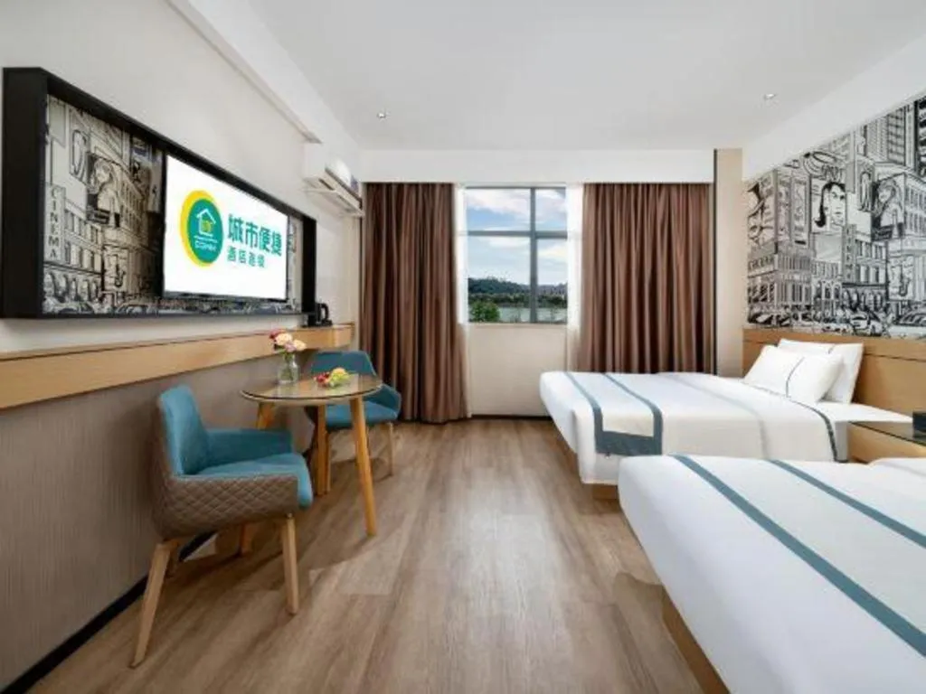 Bed in City Comfort Inn Shaoguan Biguiyuan Phoenix City Gold Village