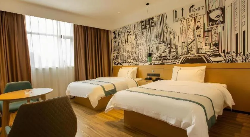 Bed in City Comfort Inn Shaoguan Biguiyuan Phoenix City Gold Village