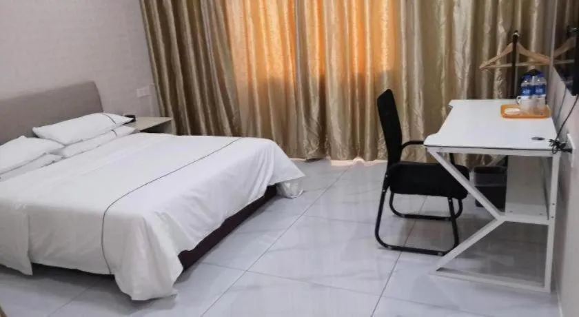 Bed in City Comfort Inn Shaoguan Biguiyuan Phoenix City Gold Village