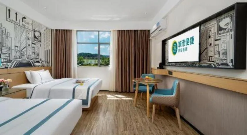 Bed in City Comfort Inn Shaoguan Biguiyuan Phoenix City Gold Village