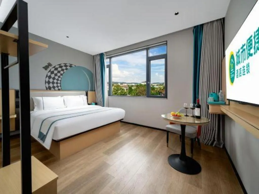 Bed in City Comfort Inn Shaoguan Biguiyuan Phoenix City Gold Village