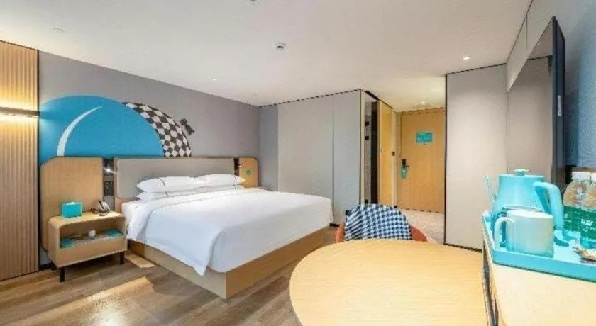 Bed in City Comfort Inn Shaoguan Biguiyuan Phoenix City Gold Village